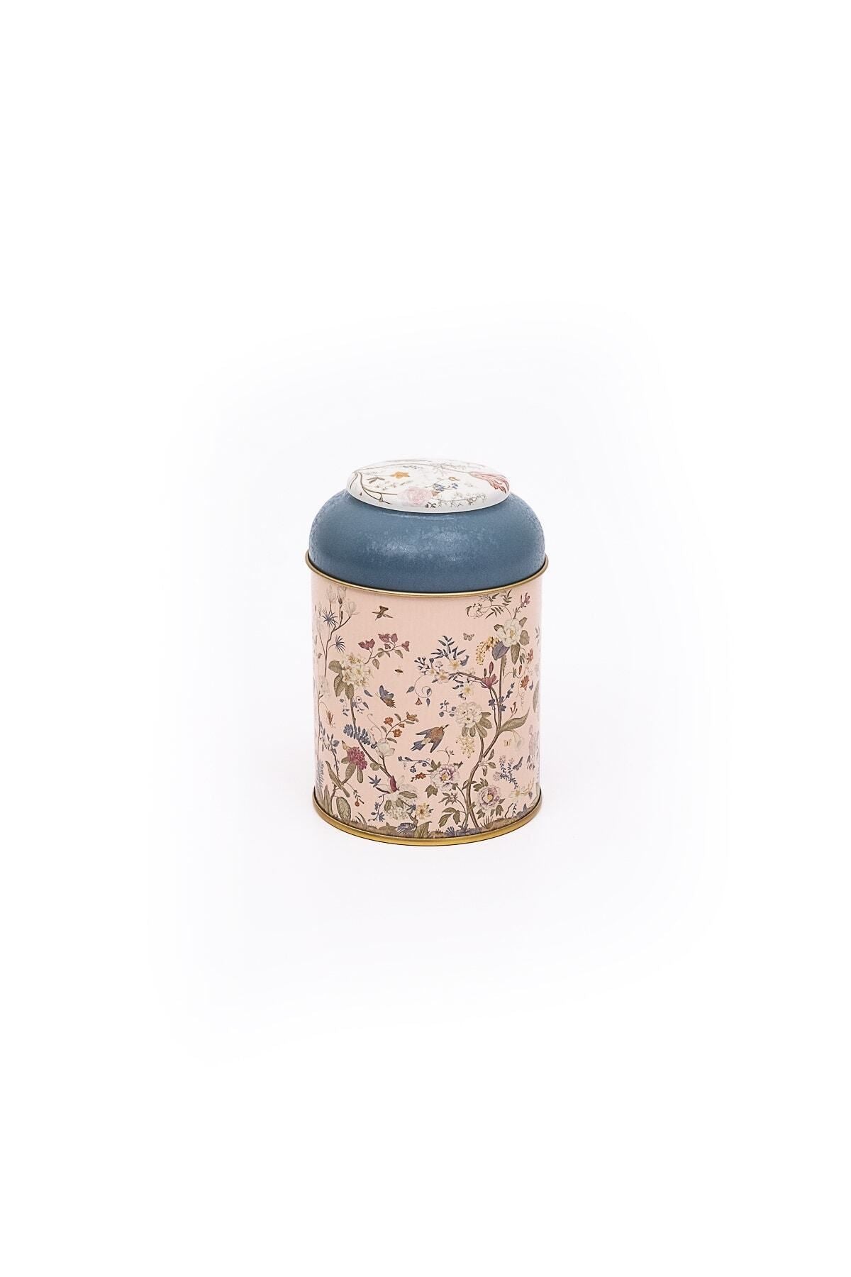 Çiçek desenli, pembe ve mavi kapaklı dekoratif kutu. Şık ve kullanışlı.